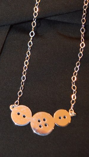 joyeria costura botones